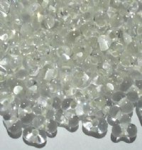 25 grams of 3x7mm Glow Lined Crystal Farfalle Seed Beads
